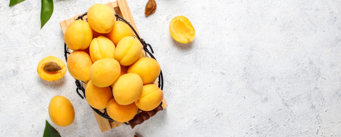 Fresh organic apricots,summer fruit,top view Fresh organic apricots,summer fruit,top view